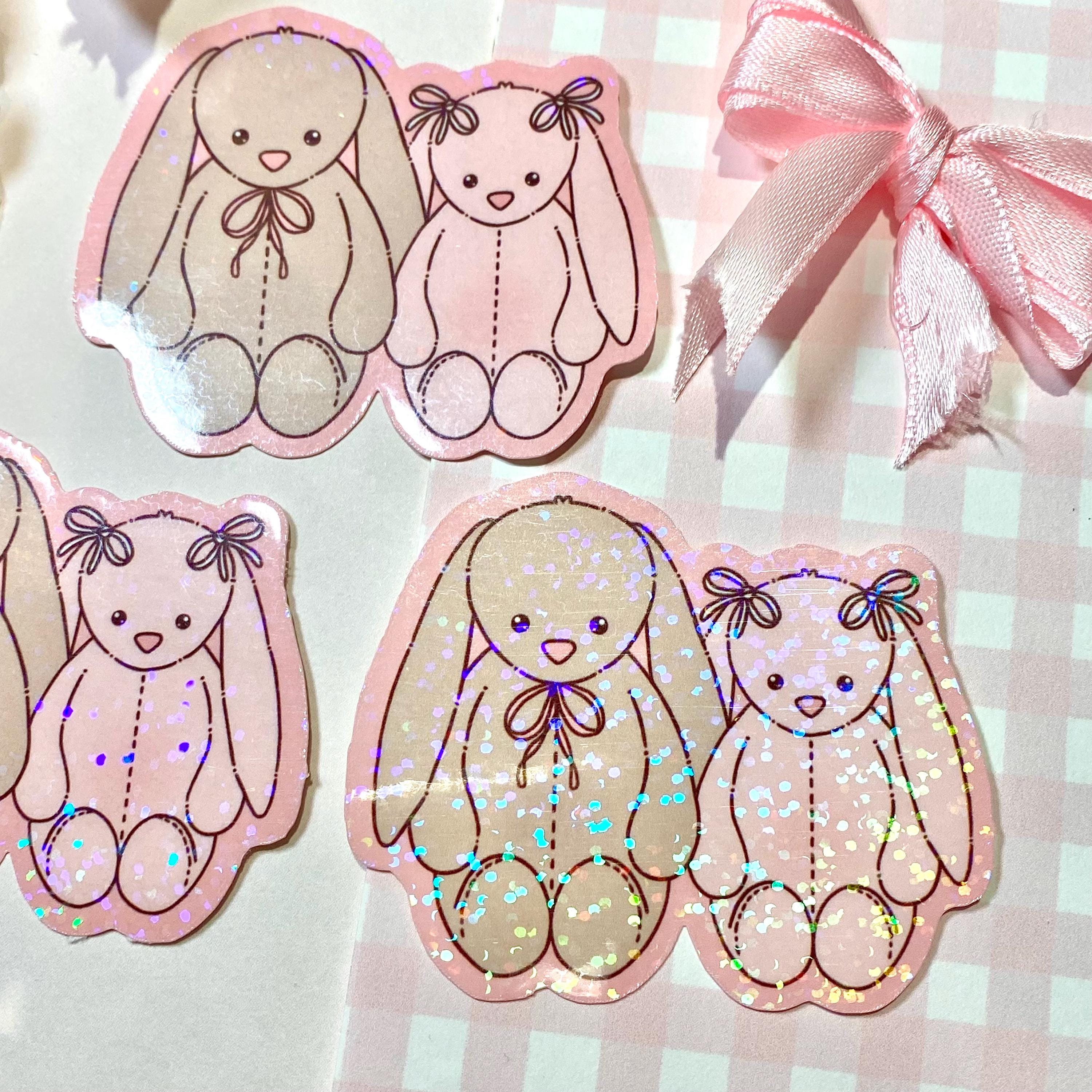 Two bunny plushies die cut vinyl holo sticker