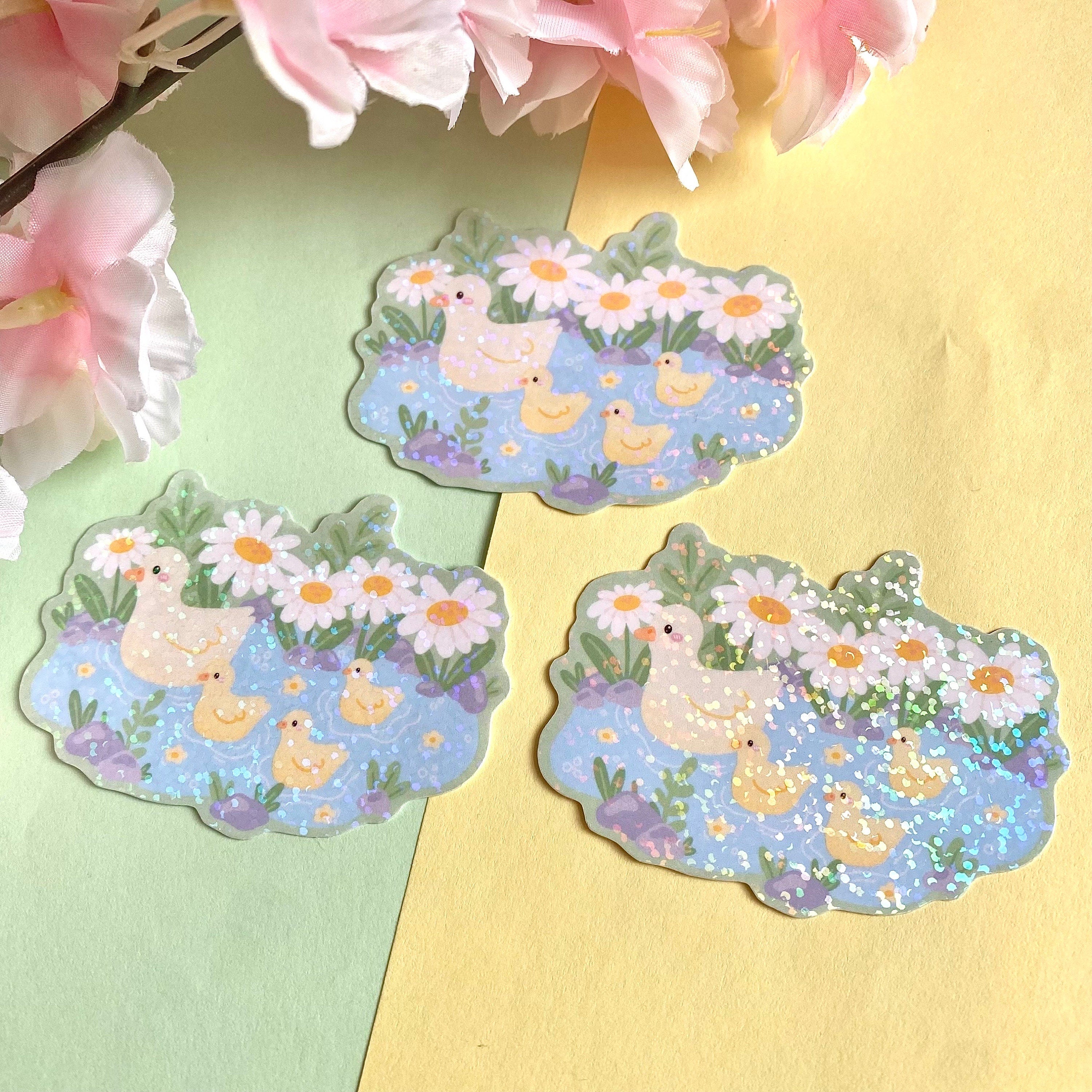 Duckies in a pond vinyl holographic die cut sticker