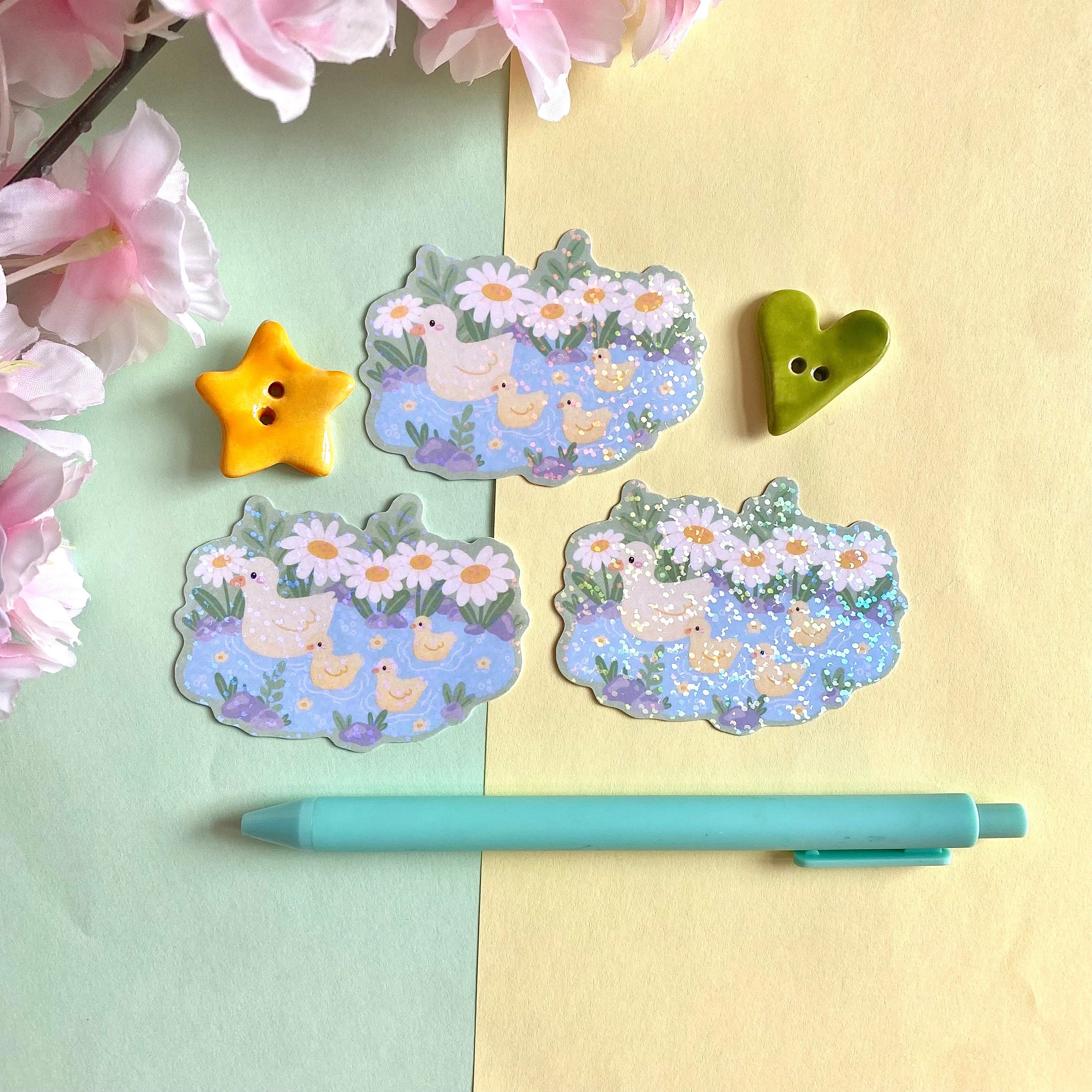 Duckies in a pond vinyl holographic die cut sticker
