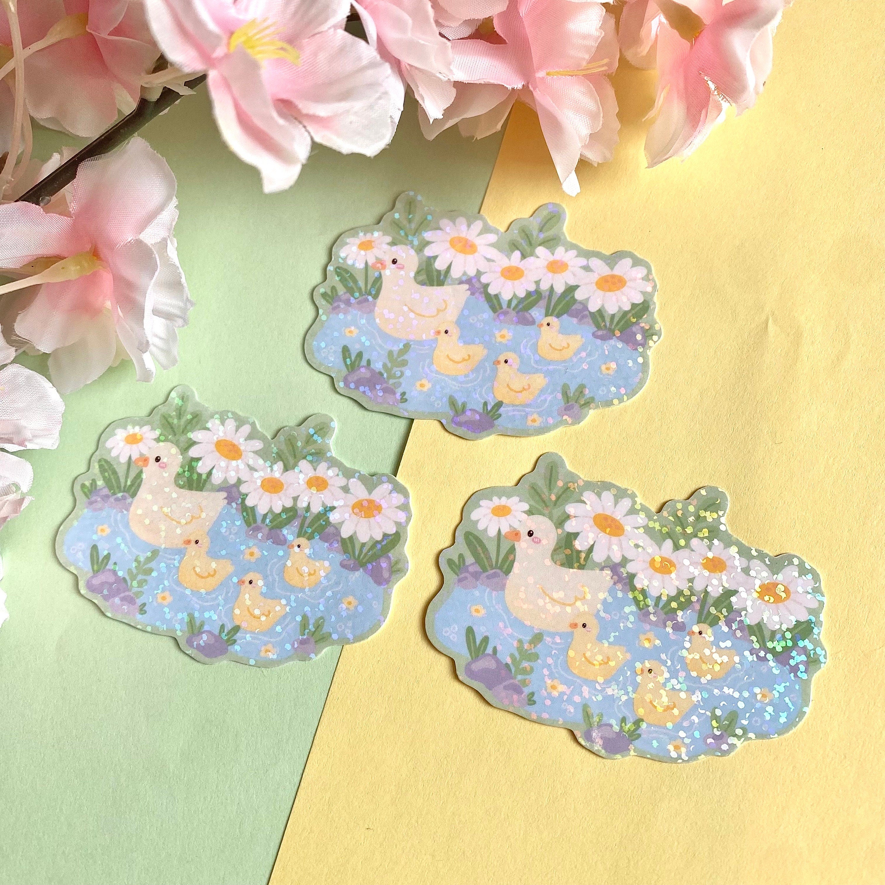 Duckies in a pond vinyl holographic die cut sticker