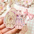 Two bunny plushies die cut vinyl holo sticker