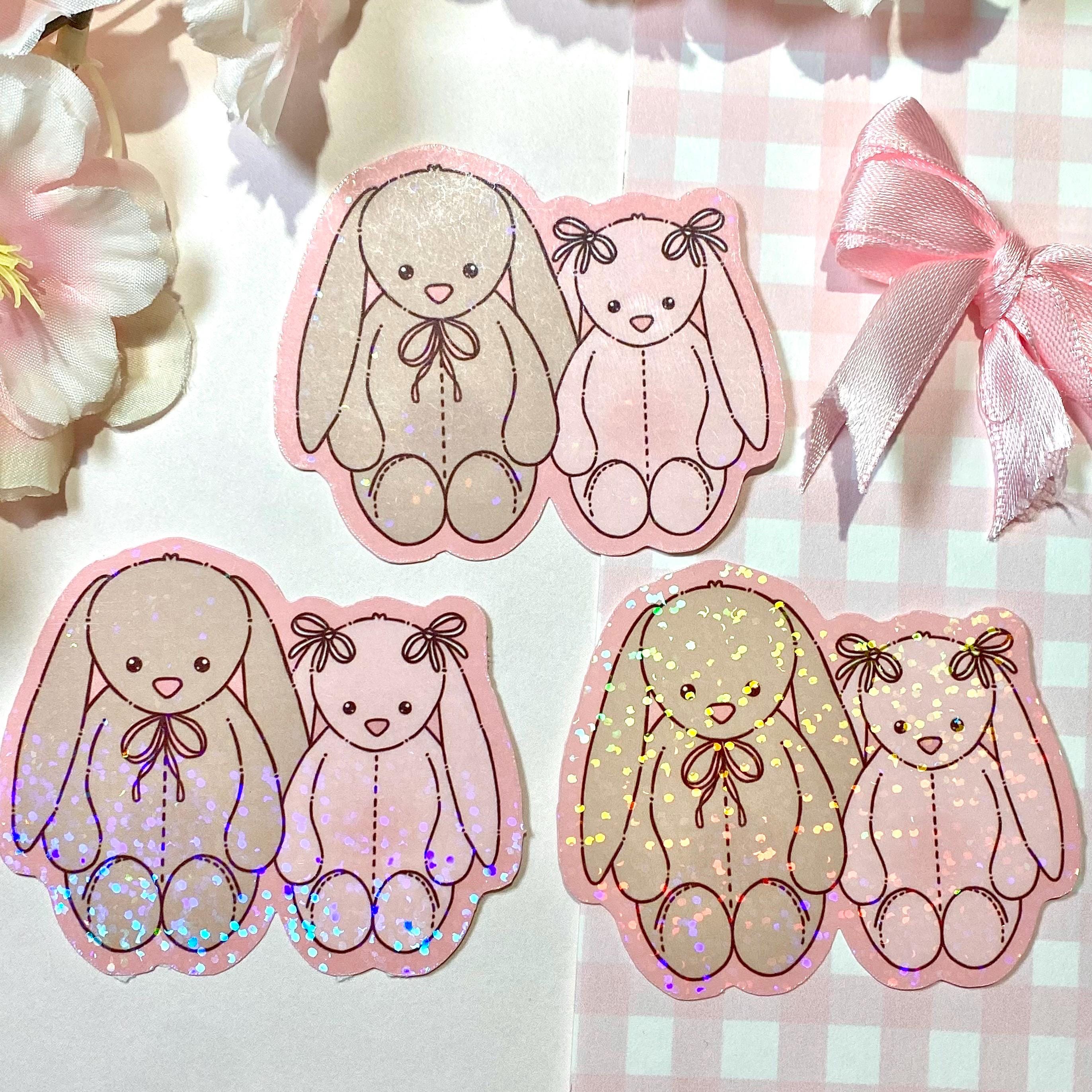 Two bunny plushies die cut vinyl holo sticker